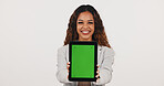 Green screen, portrait and tablet with business woman on studio space for advertising or marketing. Brand awareness, digital and promotion with friendly employee on white background for information