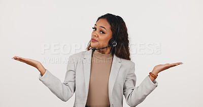 Buy stock photo Woman, headset or confused agent with choice, support or weigh options on white background in studio. Consultant, person or hand gesture in customer service, shrug or portrait for question comparison