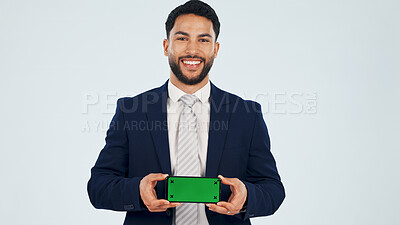 Buy stock photo Green screen, phone and portrait of business man in studio for information, offer or promotion. Display, space and technology with happy employee on white background for announcement or review