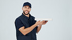 Delivery guy, portrait and pizza box in studio for takeaway, ecommerce and space with smile. Man, courier or fast food parcel with supplier, meal package and happy for Italian takeout on background