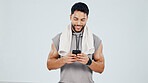 Man, smile and phone in studio for fitness app, social media notification and satisfied after workout. Space, person and typing with tech, text message and happy for wellness on white background.