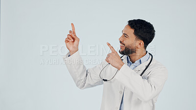 Buy stock photo Medical, point or man in studio with smile, treatment list or reminder in healthcare information. Steps, mockup space or doctor with instruction, recovery plan or wellness insight on white background