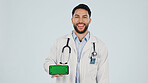 Green screen, man and portrait of doctor with cellphone in studio for clinic sign up, FAQ and telehealth. Phone, space and healthcare worker on mobile app for medical information by white background.