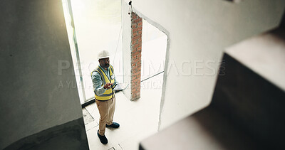 Buy stock photo Tablet, construction site and black man for inspection, evaluation or check for safety compliance. Above of civil engineer, architecture or person with tech for planning, renovation project or review