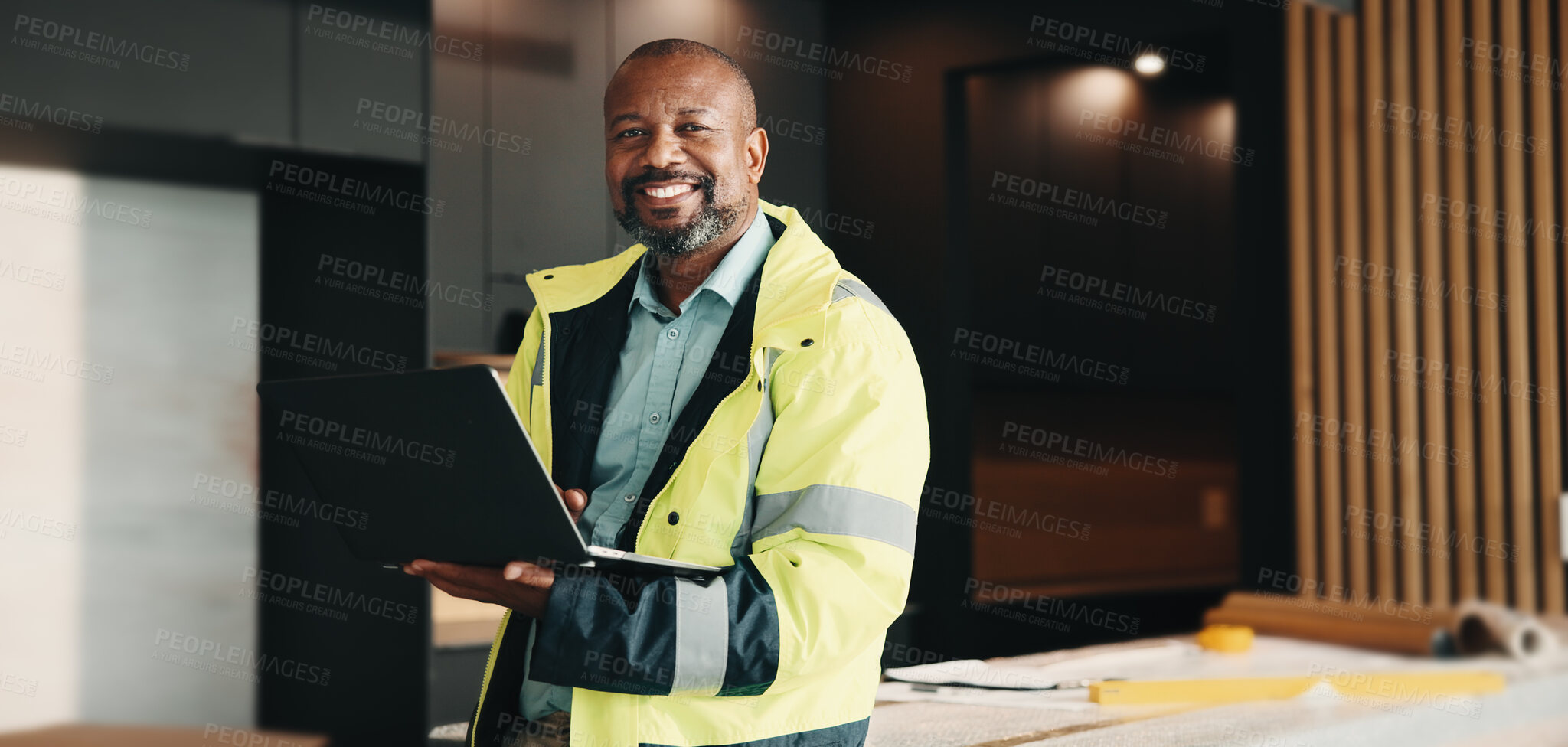 Buy stock photo Laptop, portrait and black man for construction inspection, evaluation or check for safety compliance. Mature civil engineer, architecture and person with tech for smile, renovation project or review