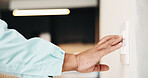 Hands, electrician and man with light switch, test and remodeling with maintenance. Closeup, person and specialist with fixture, renovation or engineering with contractor for home or system repair