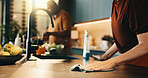 Person, hands or wiping in kitchen for hygiene, cooking preparation or sanitary disinfection. Woman, cleaning or surface with cloth or meal prep for dirt, bacteria or germ removal on counter in house
