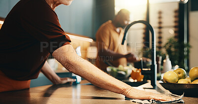 Buy stock photo Person, hands or cleaning in kitchen for hygiene, cooking preparation or sanitary disinfection. Woman, wiping or surface with cloth or meal prep for dirt, bacteria or germ removal on counter in house