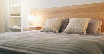 Buy stock photo Hotel, empty and bed with light for accommodation, furniture and interior design for luxury resort. Hospitality, space and bedroom with pillows, lamp and bedding for comfort, housekeeping and clean