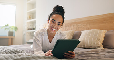 Buy stock photo Reading, ebook and woman with tablet on bed, entertainment and resting with subscription in bedroom. Digital, story and happy person with technology, internet connection and novel download in house