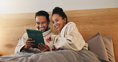 Buy stock photo Couple, laughing and relax with tablet in bedroom, entertainment and streaming funny film on website. Watching, comedy and happy people with tech, internet connection and rest with partner in home
