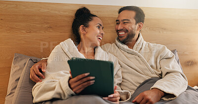 Buy stock photo Couple, hug and laughing with tablet in bedroom, entertainment and funny videos on social media app. Streaming, comedy and happy people with tech, internet connection and embrace with partner in home
