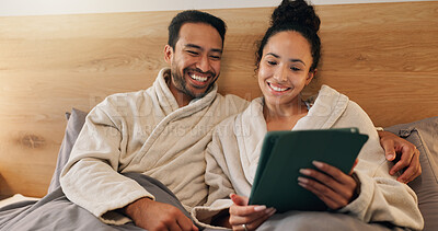 Buy stock photo Couple, rest and laughing with tablet in bedroom, entertainment and funny videos on social media app. Streaming, comedy and happy people with tech, internet connection or embrace with partner in home