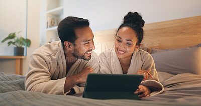 Buy stock photo Happy couple, online and relax with tablet on bed, entertainment or streaming film with subscription. Watching, movie and people with technology, internet connection and bonding with partner in house
