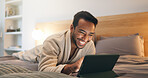 Watching, movies and man with tablet on bed, entertainment and laughing at comedy series in bedroom. Evening, rest and happy person with tech for funny film, online and app subscription in house