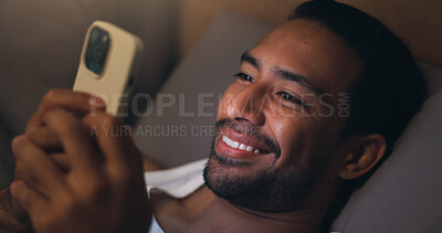 Buy stock photo Night, happy and man with phone in bed for social media, chat and browse internet for contact. Home, bedroom and person on cellphone for connection, website and check notification for entertainment