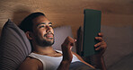 Night, reading and man with tablet on bed, entertainment and relax with app subscription in bedroom. Evening, reader and person with tech for ebook, internet connection and novel download in house