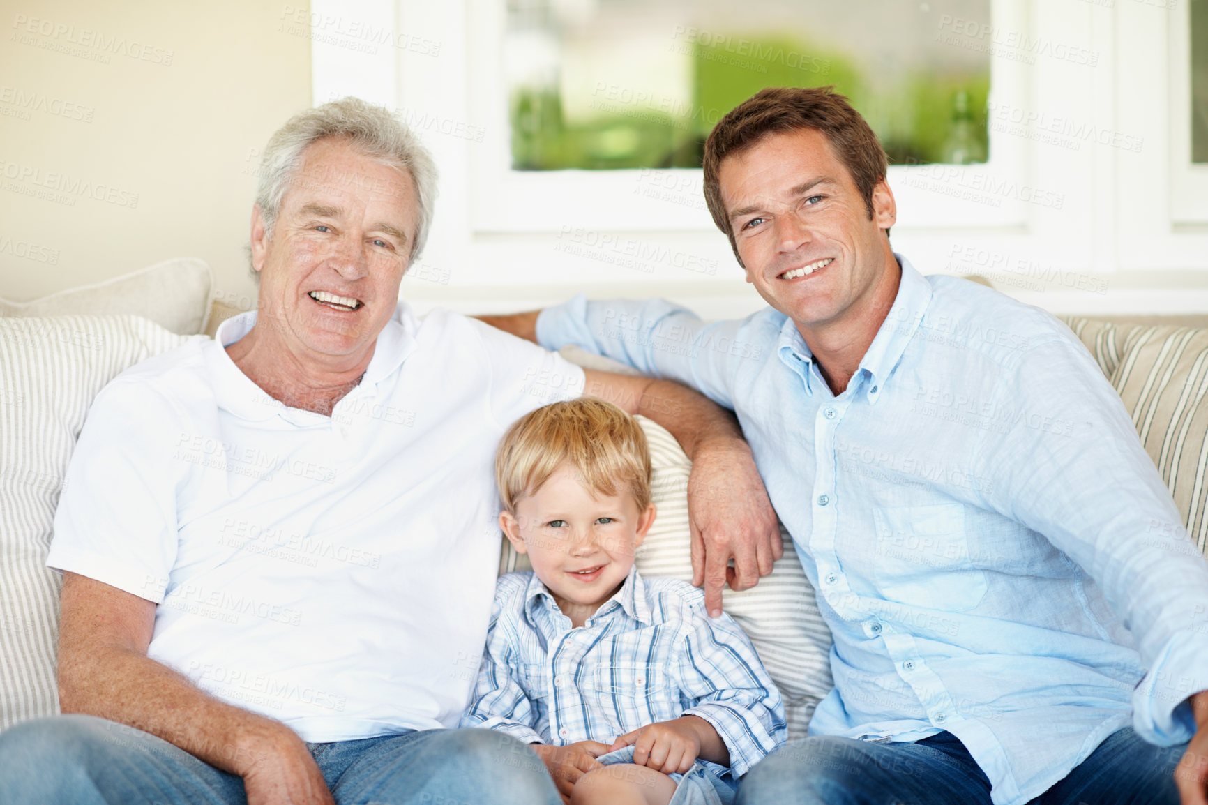 Buy stock photo Grandfather, dad and child on sofa for portrait, bonding and relax together on weekend. Generations, family and boy with grandpa, father and happy for relationship, connection and reunion in home