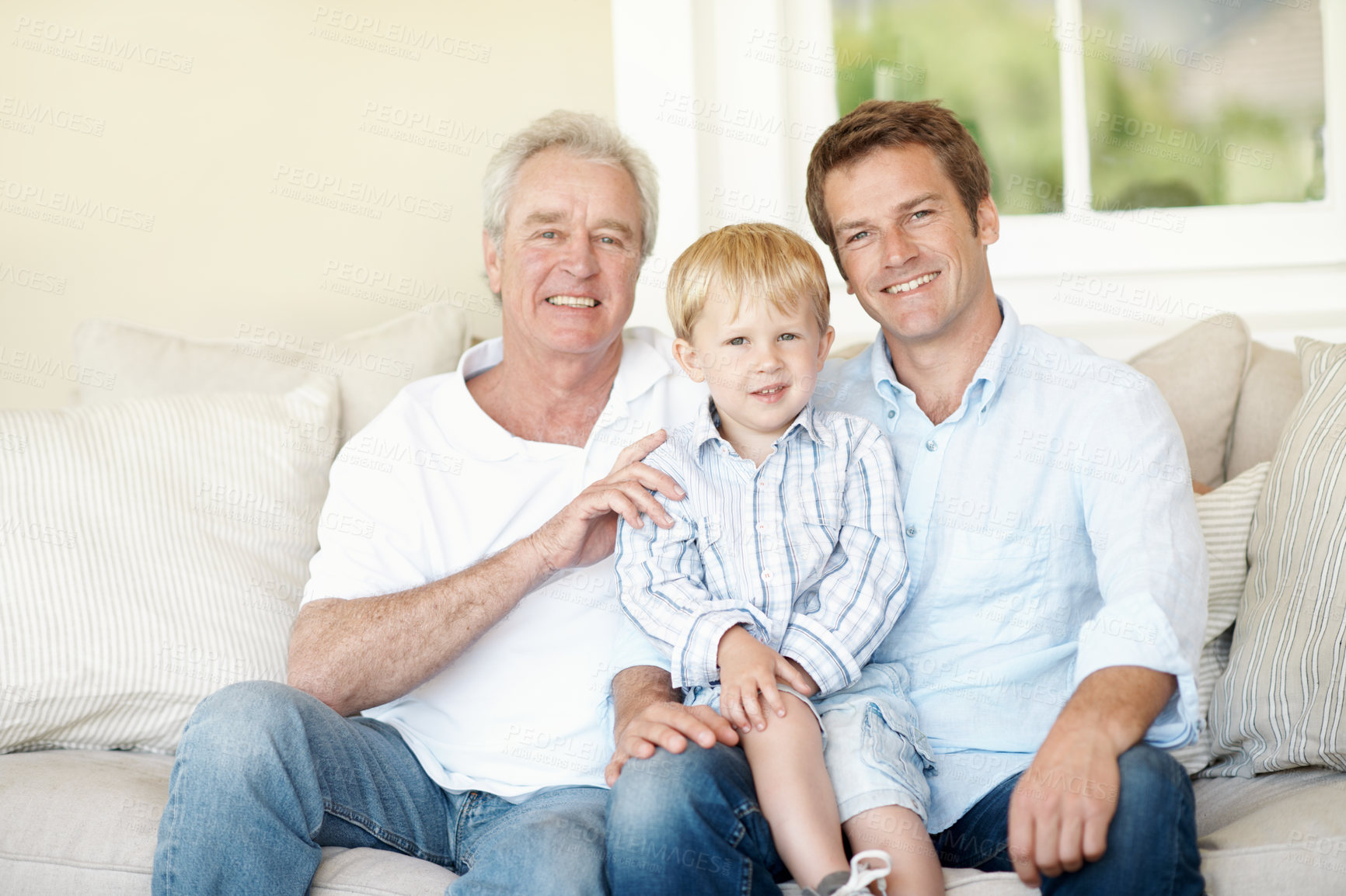 Buy stock photo Family, portrait and grandpa with child on sofa, generations or connection with grandchild in lounge. Senior man, love and people with smile for kid, support and fathers day celebration in house