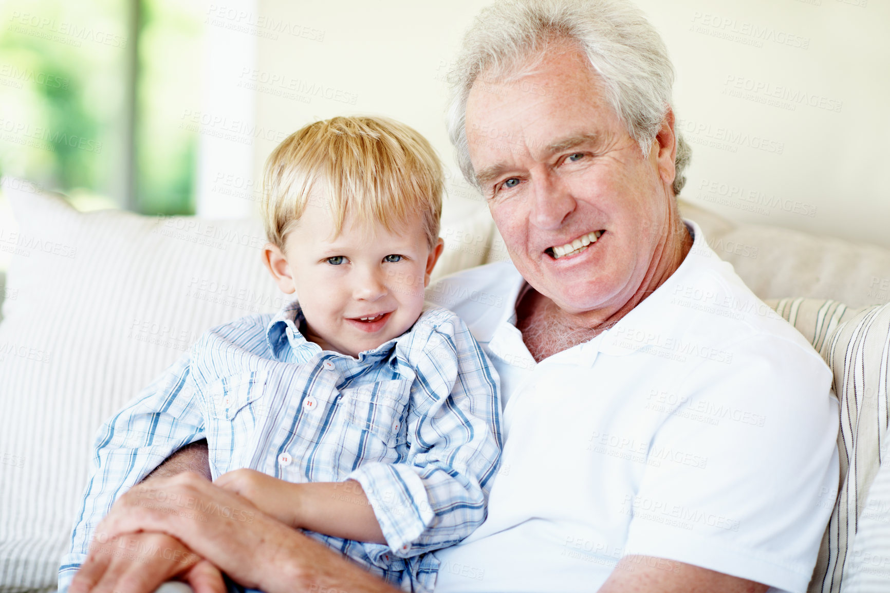Buy stock photo Happy, portrait and grandpa with child on sofa for bonding, relationship and visit on weekend. Family, relax and senior man with boy on couch for connection, support or affection in home together