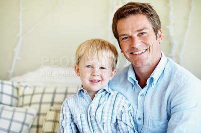 Buy stock photo Happy, portrait and dad with boy on sofa for bonding, relationship and love for fathers day. Family, smile and man with child on couch for connection, support and relax together on weekend in home