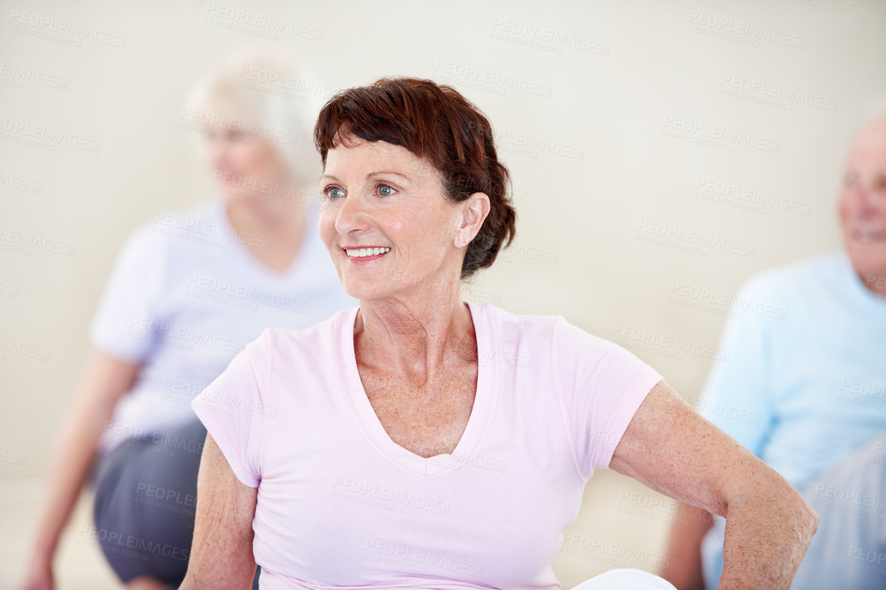 Buy stock photo Exercise, stretching and thinking with old woman in pilates studio for activity, health or wellness. Fitness, smile and warm up with senior person in gym class for flexibility, mobility or training