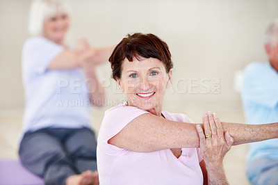 Buy stock photo Yoga, old woman and stretching portrait in class for physical mobility, start exercise and health. Studio, happy senior person and group with arm warm up for active retirement, fitness and wellness