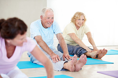 Buy stock photo Senior people, smile and stretching in health class for pilates, preparation and wellness. Old person, exercise and group in gym club with warm up, mobility workout or fitness for retirement
