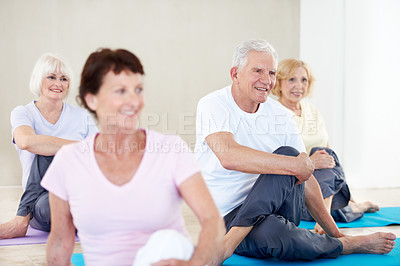 Buy stock photo Old people, smile and stretching in gym class for pilates, preparation and wellness. Senior person, instructor and group in health club with warm up, mobility exercise or fitness for retirement