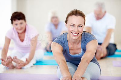 Buy stock photo People, portrait and fitness coach in senior exercise class for balance, wellness and active retirement. Woman, happy group and instructor for teaching, pilates and stretching for health in old age