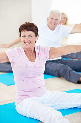 Buy stock photo Portrait, old woman and stretching with people for yoga, holistic balance and retirement hobby. Smile, yogi and warm up with senior community for fitness, physical therapy and guidance for wellness