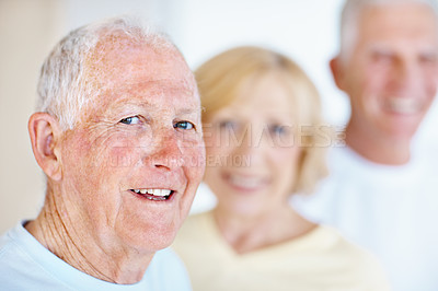 Buy stock photo Wellness, smile and old people in house with portrait, positive attitude and optimism on weekend break. Wellbeing, happy and friends with good mood, confidence and satisfaction in retirement home.