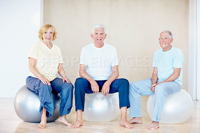 Buy stock photo Senior people, portrait and exercise ball in gym for pilates, preparation and wellness. Elderly person, smile and group in health club with equipment, mobility development or fitness for retirement