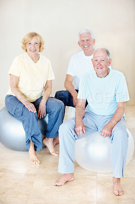 Buy stock photo Senior people, portrait and exercise ball in gym for pilates, preparation and wellness. Elderly person, smile and group in health club with confidence, mobility workout or fitness for retirement