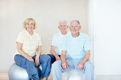 Buy stock photo Fitness, portrait and old people on balls with gym class, smile or exercise for retirement wellness. Happy, elderly group and balance with workout equipment, positive attitude and training together.