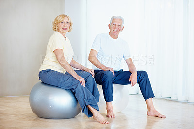 Buy stock photo Fitness, portrait and old couple on ball with gym class, smile and exercise for retirement wellness. Married, elderly people and happy with workout equipment, positive attitude and training together.