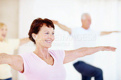 Buy stock photo Pilates, smile and stretching with senior woman in studio for fitness, health or wellness. Exercise, happy and group with old people in gym class together for activity, retirement or training