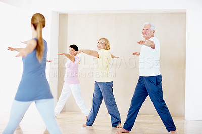 Buy stock photo Yoga, instructor and elderly people in portrait with stretching, support and fitness in retirement. Senior group, trainer and warrior pose at facility for teaching, posture wellness or exercise class