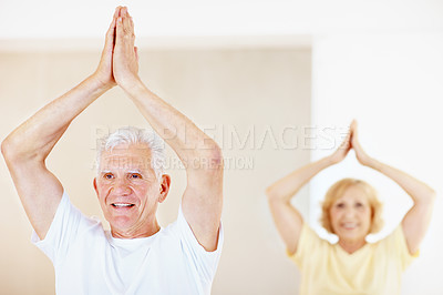 Buy stock photo Exercise, hands together and thinking with old man in pilates studio for activity, health or wellness. Fitness, peace and vision with senior person in gym class for flexibility, mobility or training