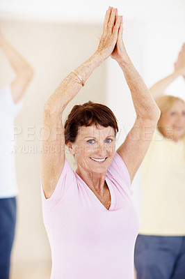 Buy stock photo Pilates, portrait and stretching with senior woman in studio for fitness, health or wellness. Exercise, hands together and smile with old person in gym class for activity, retirement or training