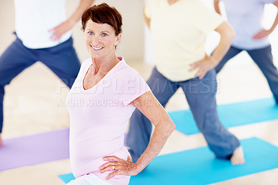 Buy stock photo Fitness, yoga and old woman with stretching in class for physical mobility, exercise or portrait. Active, senior person or group with muscle warm up in studio for retirement health, wellness or smile