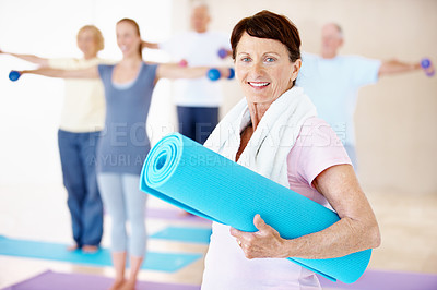 Buy stock photo Fitness, old woman and happy in pilates class for morning wellness, portrait or ready for exercise. Retirement, senior person or smile with mat in studio for club membership, start practice or health