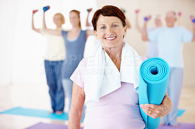 Buy stock photo Fitness, old woman and smile in pilates class for morning wellness, portrait or ready for exercise. Retirement, senior person or happy with mat in studio for club membership, start practice or health