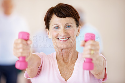 Buy stock photo Fitness, portrait or old woman in gym with dumbbells, arm workout or mobility in wellness activity. Smile, active or senior person with equipment, muscle strength or weightlifting in retirement hobby