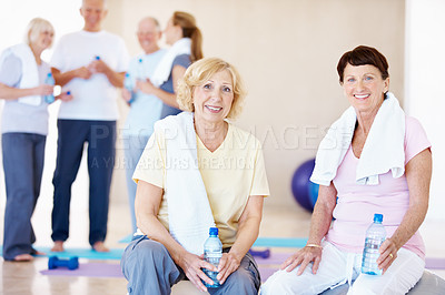 Buy stock photo Fitness, portrait or old women in gym with break, cardio rest or bonding in workout hobby. Smile, cool down or friends in center with water bottle, class connection or recovery in retirement training
