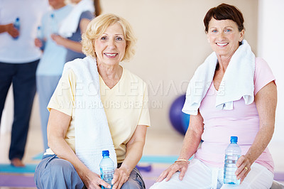 Buy stock photo Fitness, portrait or old women in class with break, cardio rest or bonding in workout hobby. Smile, cool down or friends in club with water bottle, team connection or recovery in retirement training.
