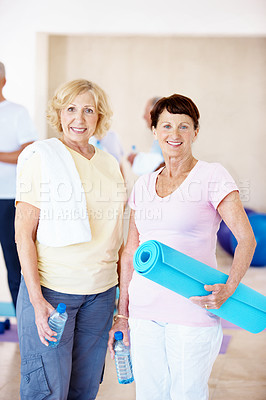 Buy stock photo Gym, portrait and senior women with water, wellness and confident for physical activity and fitness. Happy, elderly people and break in health club, pride and friends with exercise mat in Canada
