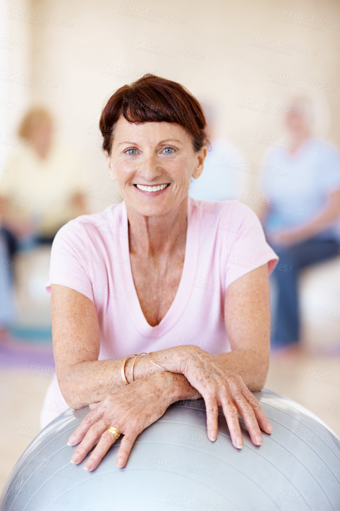 Buy stock photo Old woman, portrait and exercise ball in gym for pilates, preparation and wellness. Elderly person, smile and group in health club with muscle development, mobility workout or fitness for retirement