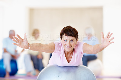 Buy stock photo Senior woman, portrait and swiss ball in gym for flexibility, exercise preparation or wellness. Elderly person, smile and group in health club with pilates, mobility workout or fitness for retirement