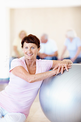 Buy stock photo Old woman, portrait and swiss ball in gym for flexibility, exercise preparation or wellness. Senior person, smile and group in health club with pilates, mobility development or fitness for retirement